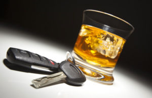 DUI conviction concept, glass and car keys